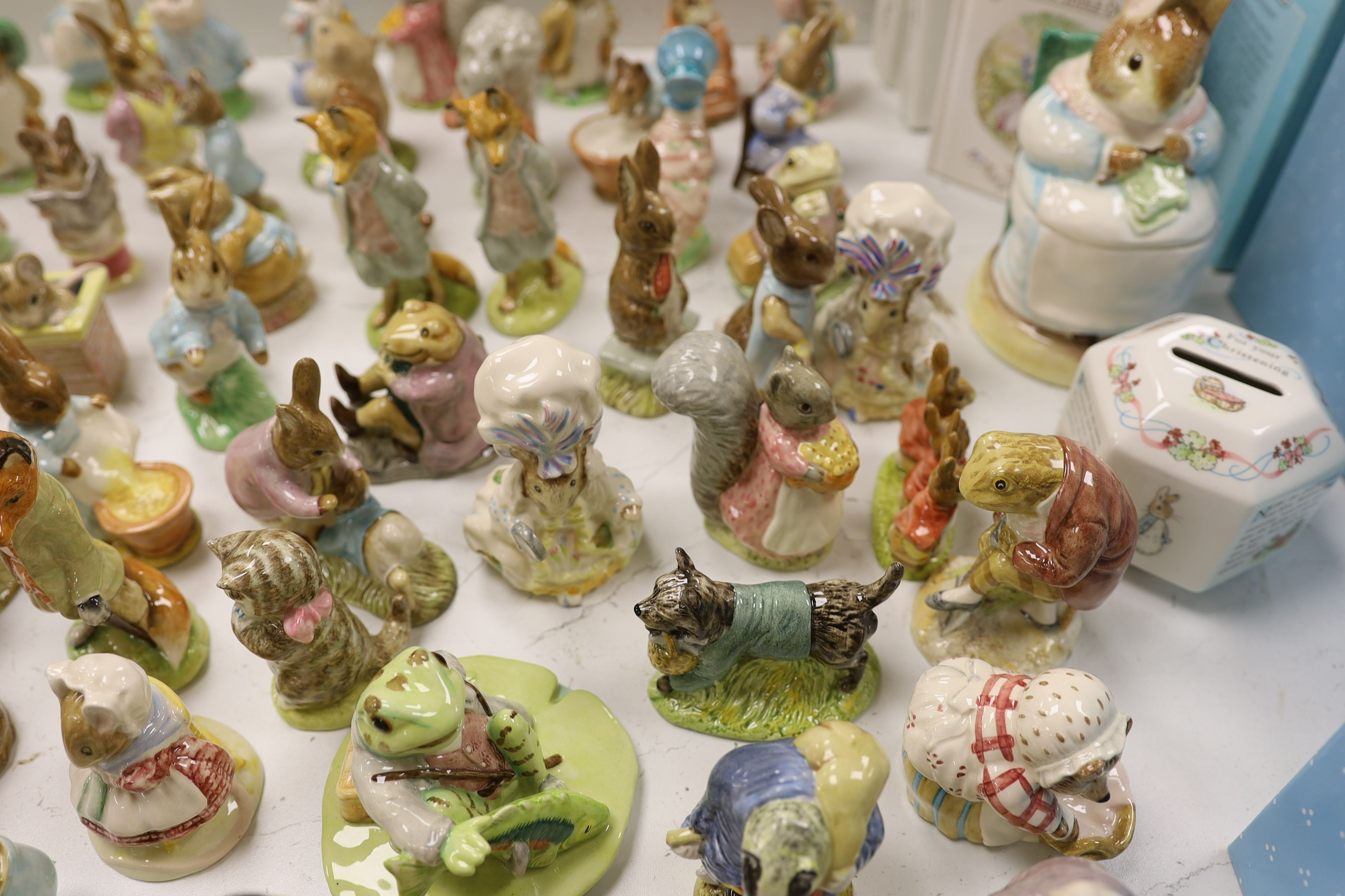 A large collection of various Beswick Beatrix Potter figures, money boxes etc.